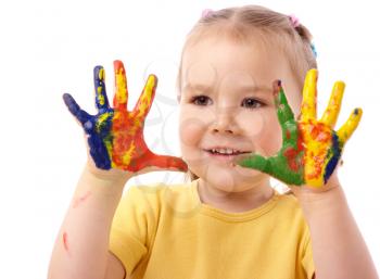 Royalty Free Photo of a Girl Fingerpainting