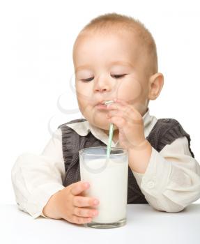 Royalty Free Photo of a Little Boy With a Glass of Milk