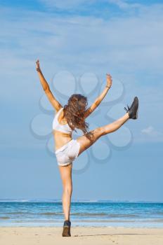 Royalty Free Photo of a Happy Woman at the Beach