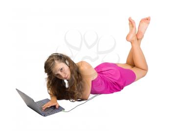 Royalty Free Photo of a Girl at a Computer Listening to Music
