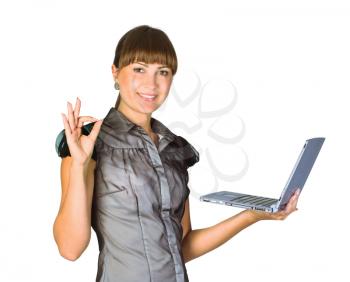 Royalty Free Photo of a Woman Saying Okay While Holding a Laptop