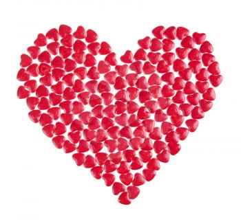 red hearts shaped from candy as background