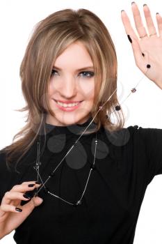 Royalty Free Photo of a Girl in Black Holding Beads