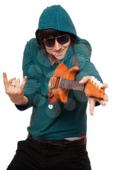 Royalty Free Photo of a Guy With a Toy Guitar