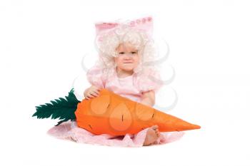 Royalty Free Photo of a Baby in a Costume Holding a Big Carrot
