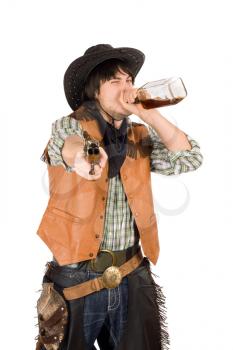 Royalty Free Photo of a Cowboy Drinking
