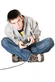 Royalty Free Photo of a Kid Playing a Video Game