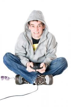 Royalty Free Photo of a Boy Playing Games