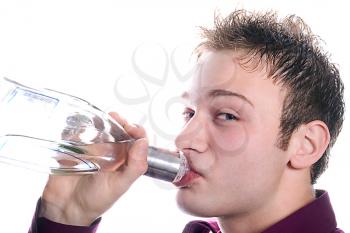 Royalty Free Photo of a Man Drinking From a Bottle