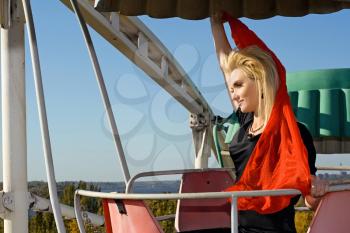 Royalty Free Photo of a Woman on a Ferris Wheel