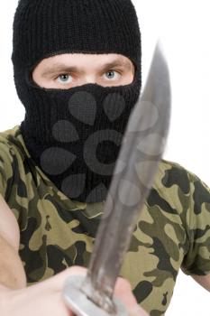 Royalty Free Photo of a Man Wearing a Balaclava Holding a Knife
