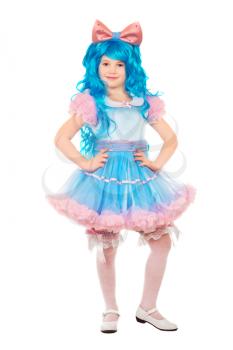 Positive little girl posing wearing luxury dress and blue wig. Isolated on white
