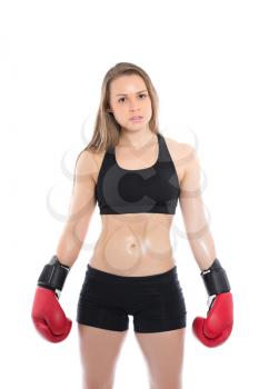 Young blond woman posing with red boxing gloves. Isolated on white