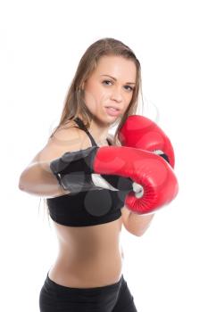 Pretty woman posing with boxing gloves. Isolated on white