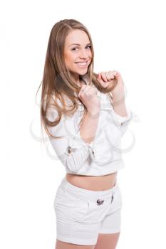Portrait of smiling young woman wearing white clothes. Isolated on white