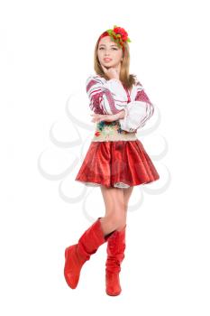 Attractive little girl posing in Ukrainian national clothes. Isolated on white