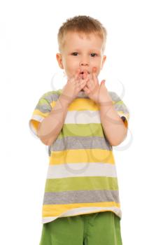 Little boy in striped t-shirt playing with his fingers. Isolated on white
