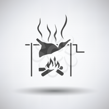 Roasting meat on fire icon on gray background with round shadow. Vector illustration.