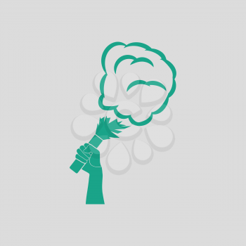 Football fans hand holding burned flayer with smoke icon. Gray background with green. Vector illustration.