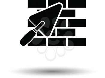 Icon of brick wall with trowel. White background with shadow design. Vector illustration.