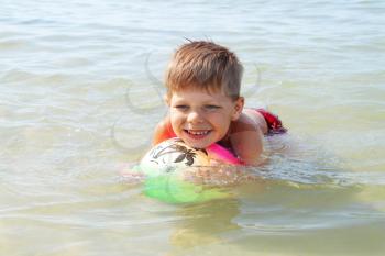 Royalty Free Photo of a Little Boy Swimming 