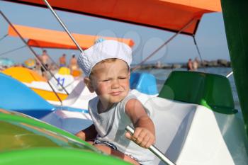 Royalty Free Photo of a Little Boy on a Boat