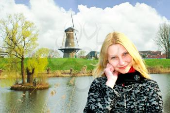 Girl on the waterfront in the Dutch town of Gorinchem. Netherlands