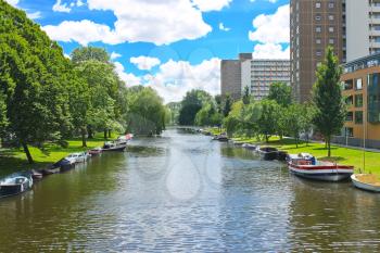 Boats on  canal in  park in Amsterdam. Netherlands