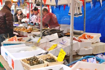 DELFT, THE NETHERLANDS - APRIL 7, 2012 : Selling seafood on the market in Delft, Netherlands