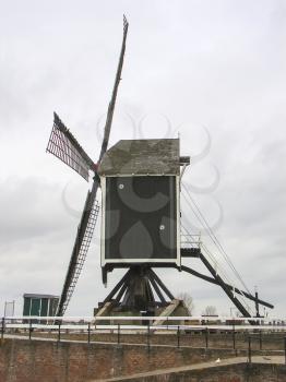 Old windmill and pierl in Heusden. Netherlands