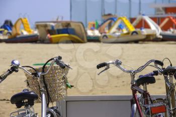 Bikes on the beach parking lot on a sunny day
