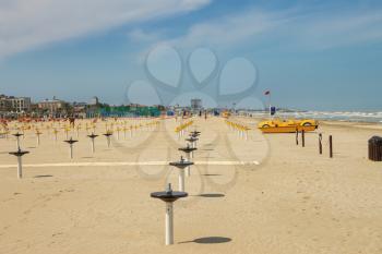 CERVIA, ITALY - MAY 05, 2014: Spring beach. Preparing for the season. Cervia is one of the most popular resorts of the Adriatic coast of Italy