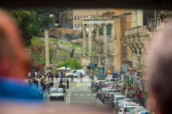 ROME, ITALY - MAY 03, 2014: Tourists  see the sights of Rome from the window of a tourist bus, Italy