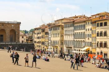 FLORENCE, ITALY - MAY 08, 2014: Tourists on a sloping square before the Palace Pitti