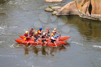 NIKOLAEV, VILLAGE GRUSHEVKA, UKRAINE - MAY 23, 2014: Rafting tourists with an experienced instructor on the river Southern Bug
