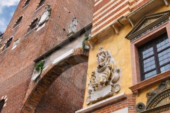 The bas-reliefs and statues on buildings in Piazza della Signoria in Verona, Italy