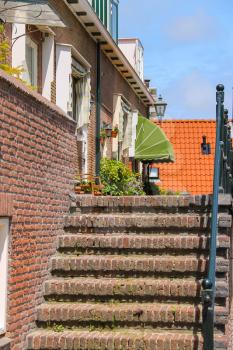 Brick stairway to entrance door in Kerkstraat street, Zandvoort, the Netherlands.