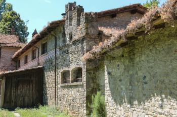 Old stone building of ancient castle in Grazzano Visconti, Italy