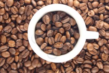 Royalty Free Photo of Coffee Beans and a Cup