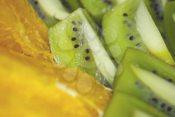 Royalty Free Photo of Freshly-Cut Kiwi and Orange Slices