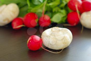 Radish with champignion healthy raw food. Organic vegetarian meal ingredients. Fresh salad vitamin vegan eating.