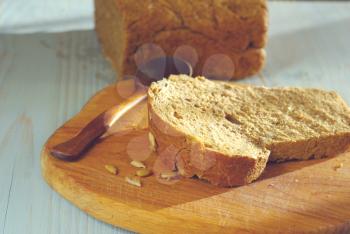 Bread slice Organic food homemade wholegrain healthy nutrition. Rustical bread oldstyle eating. Tasty baker meal closeup. 