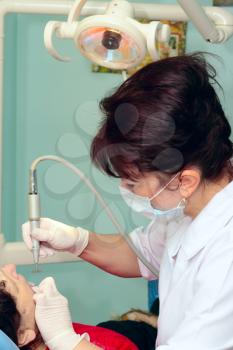 Royalty Free Photo of a Dentist Working