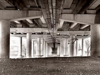 bottom view of a concrete bridge in grunge style