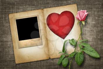  old-style photo  with red paper heart with pink rose  in vintage style