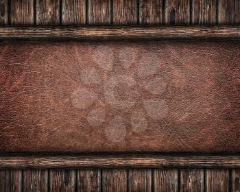 leather background framed by old wooden planks