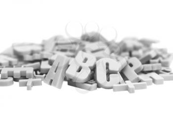 Black and white alphabet letters on a magnet