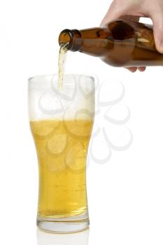 Royalty Free Photo of a Person Pouring a Beer
