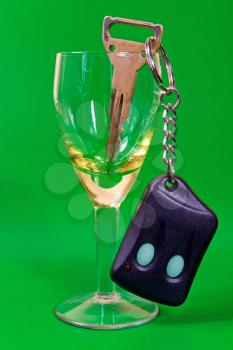 Royalty Free Photo of Car Keys in a Wine Glass