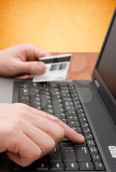 Royalty Free Photo of a Person Shopping Online